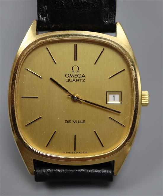 A gentlemans 1970s steel and gold plated Omega De Ville quartz wrist watch, on associated leather strap.